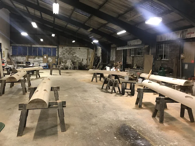 Oak beams on trestles in the Lakeland Oak workshop near Penrith